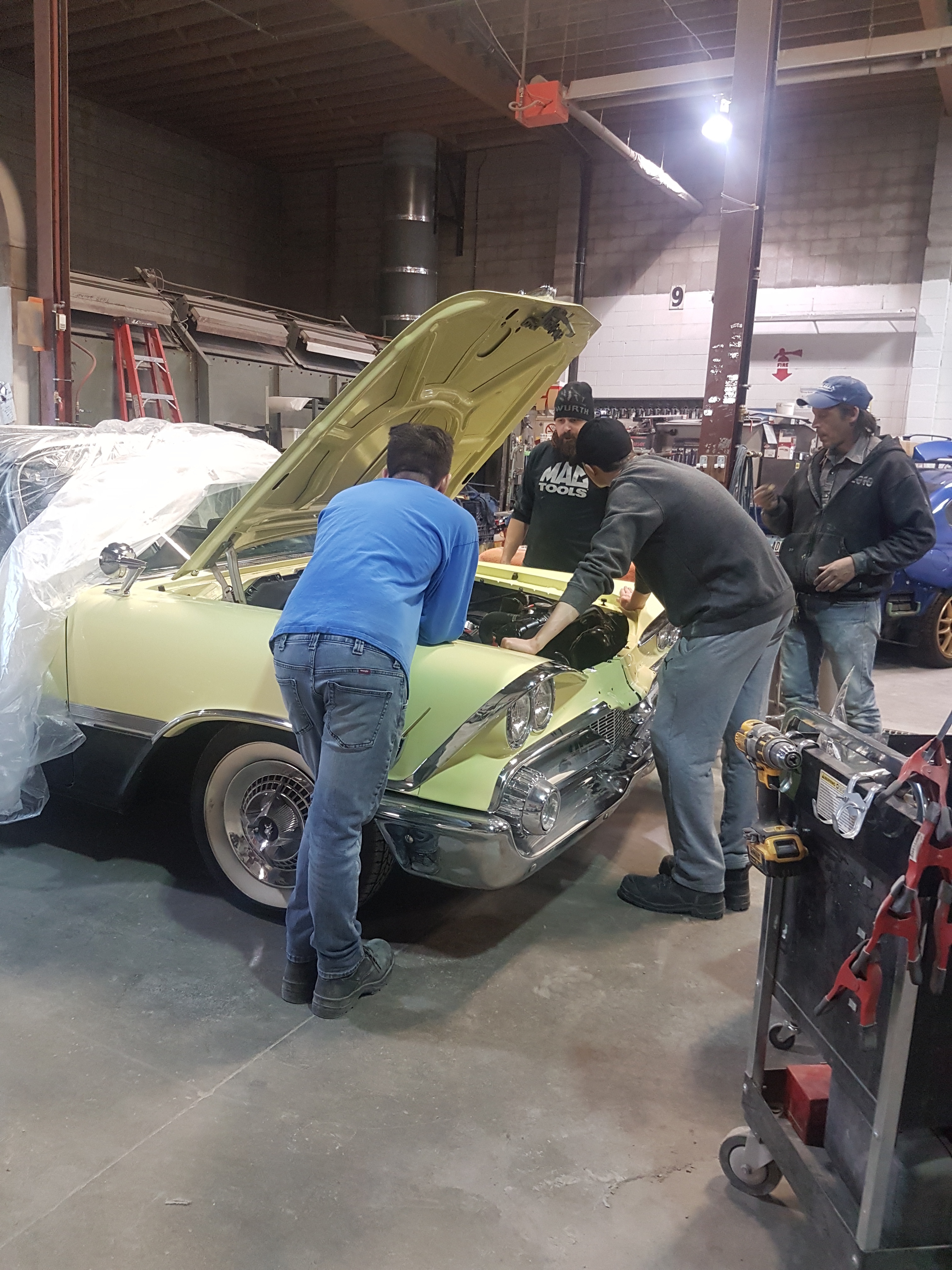 Four autobody technicians discuss how to repair 1959 Dodge Custom Royale convertible