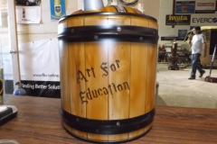 "Art of Education" graces this impressively painted wooden barrel - oops I mean tin!